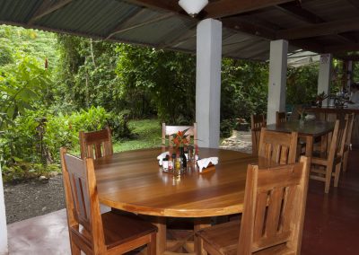 The dining room furniture is hand crafted with sustainable tropical hardwoods