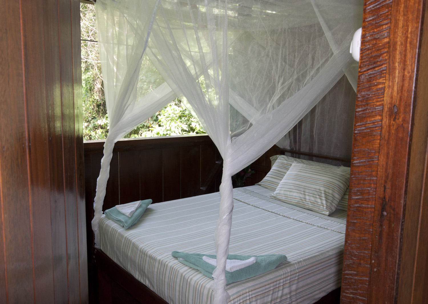 Our lodge uses fine fabrics and romantic netting for the beds